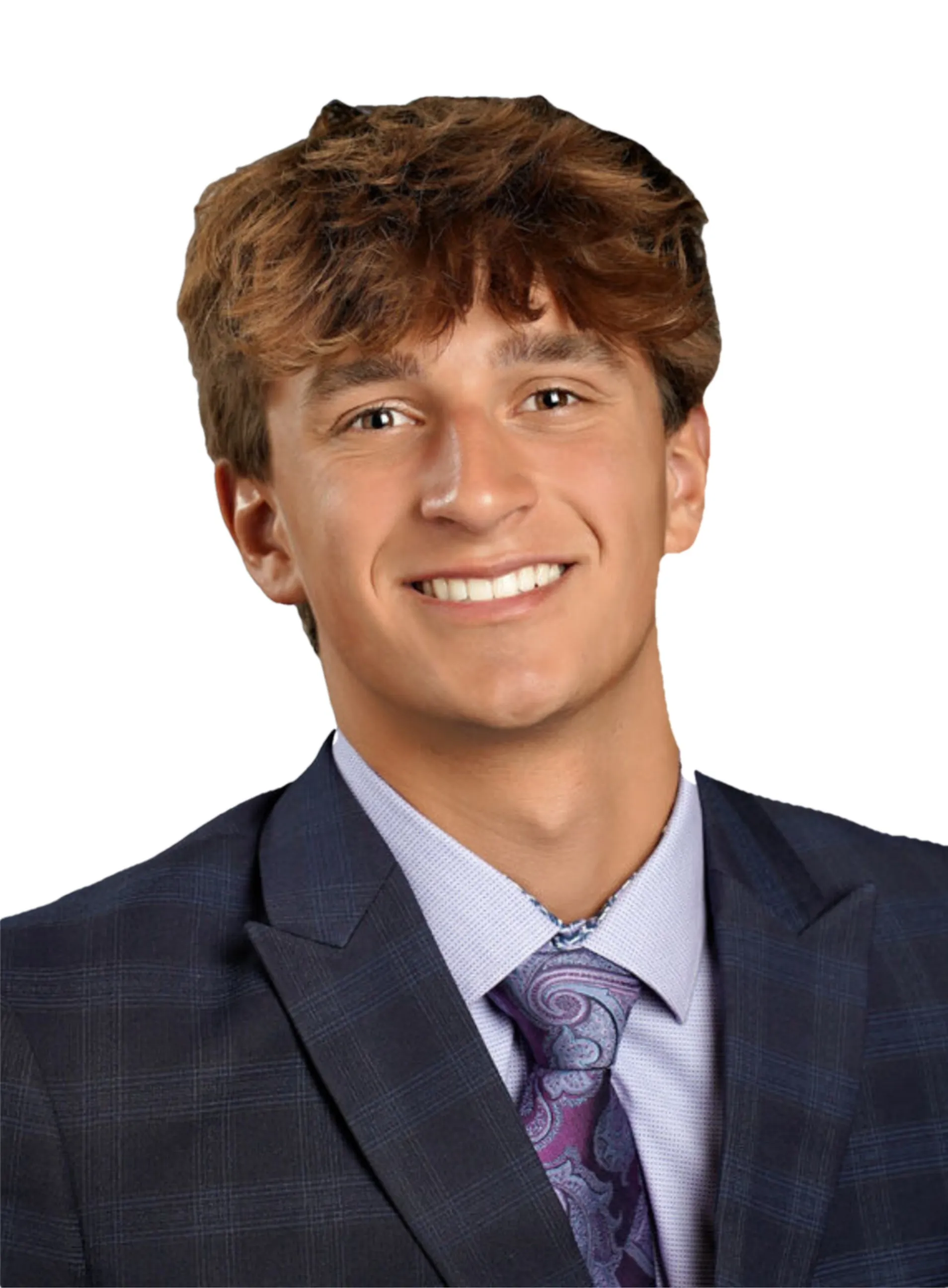 Portrait of Maclane Zich in a navy suit and paisley tie on a white background